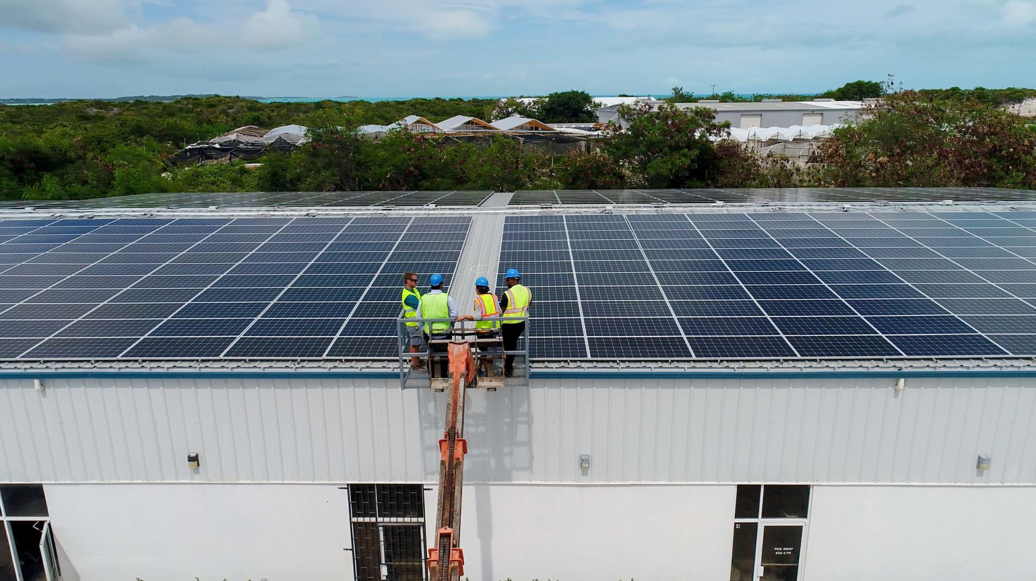 FortisTCI and Green Revolution Representatives View First Solar Photovoltaic System Connected to the FortisTCI Grid